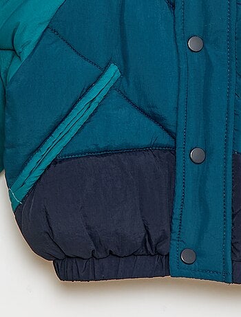 Abrigo acolchado impermeable con capucha color block