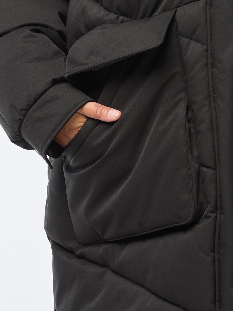 Abrigo acolchado largo con capucha y bolsillos con forro polar Negro - Kiabi