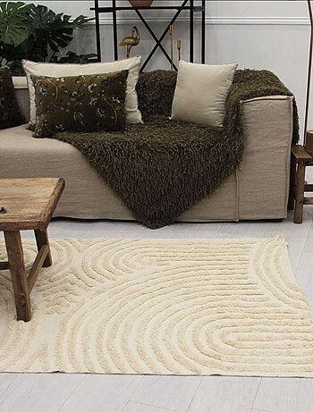 Alfombra con relieve de círculos curvos