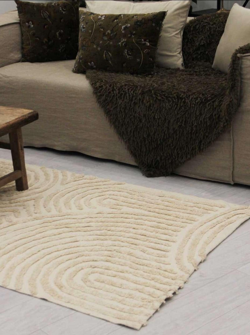 Alfombra con relieve de círculos curvos Crudo - Kiabi