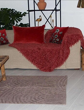 Alfombra con relieve de círculos curvos