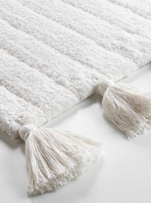 Alfombra de baño liso y con pompones - Kiabi