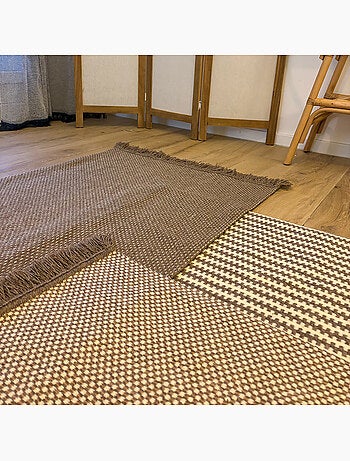 Alfombra de lana y algodón con motivos geométricos