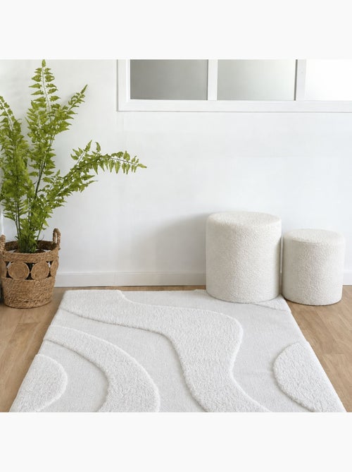Alfombra de salón con motivo ondulado en relieve y efecto texturizado - Kiabi Alfombra de salón con motivo ondulado en relieve y efecto texturizado - Kiabi