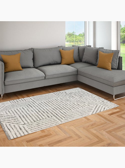Alfombra de salón de algodón tejido JIVE geométrica retro 140 x 200 cm – Future Home - Kiabi Alfombra de salón de algodón tejido JIVE geométrica retro 140 x 200 cm – Future Home - Kiabi