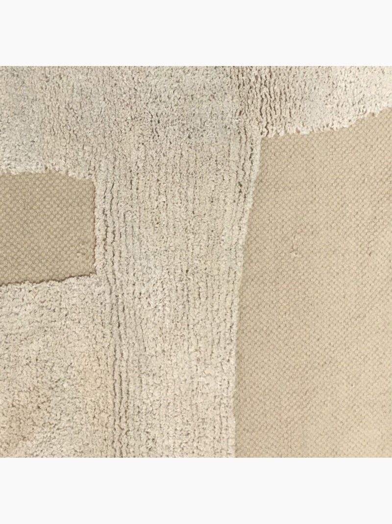Alfombra decorativa con flecos abstractos de algodón. Beige - Kiabi