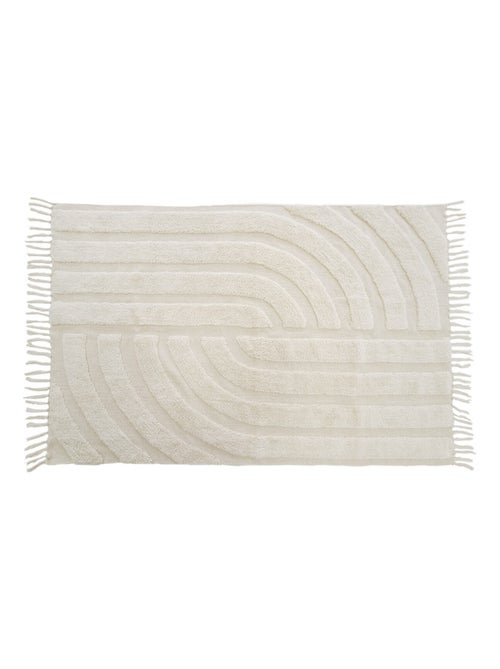 Alfombra decorativa de algodón tuftada con flecos 100 x 150 cm – Future Home - Kiabi Alfombra decorativa de algodón tuftada con flecos 100 x 150 cm – Future Home - Kiabi