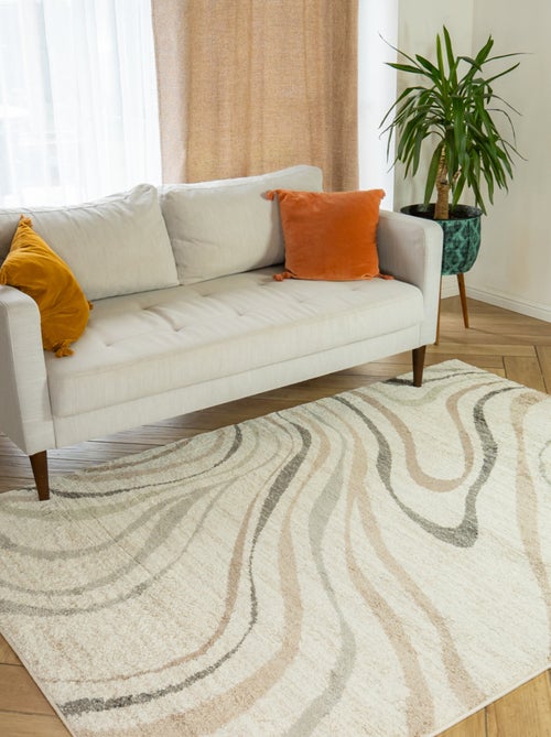 Alfombra decorativa de interior con diseño abstracto - Kiabi Alfombra decorativa de interior con diseño abstracto - Kiabi