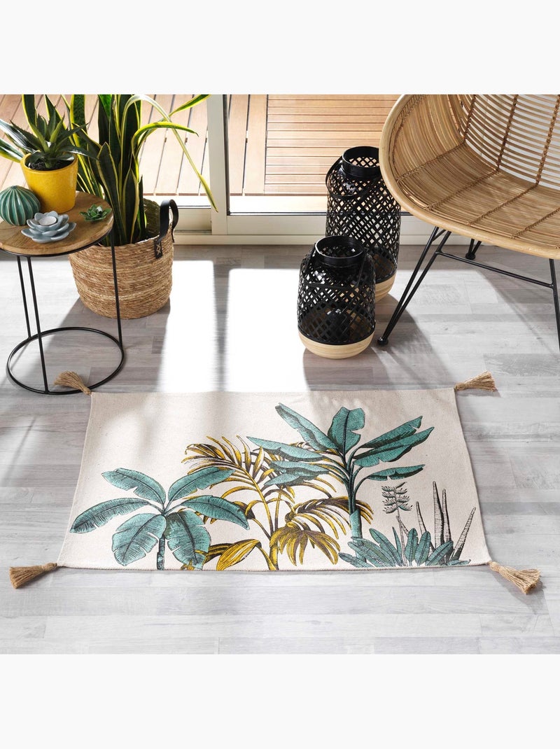 Alfombra estampada con motivos de follaje exótico y pompones Multicolor - Kiabi