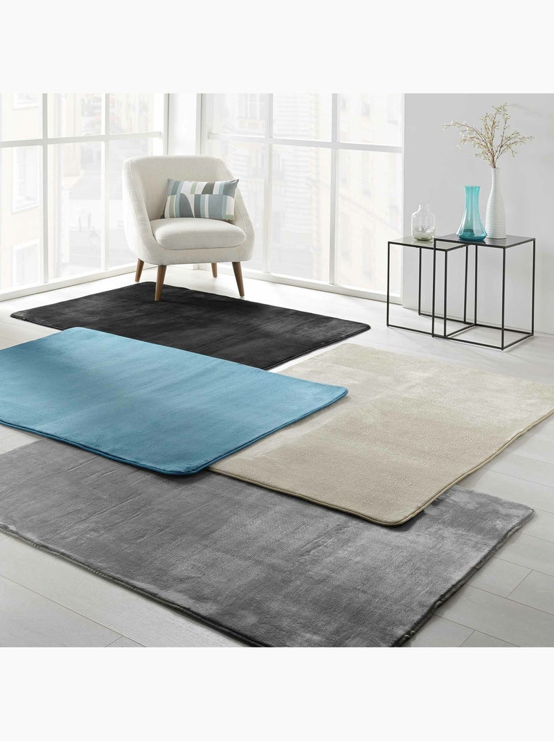 Alfombra rectangular – franela lisa ultra suave – acabado al bies Azul - Kiabi