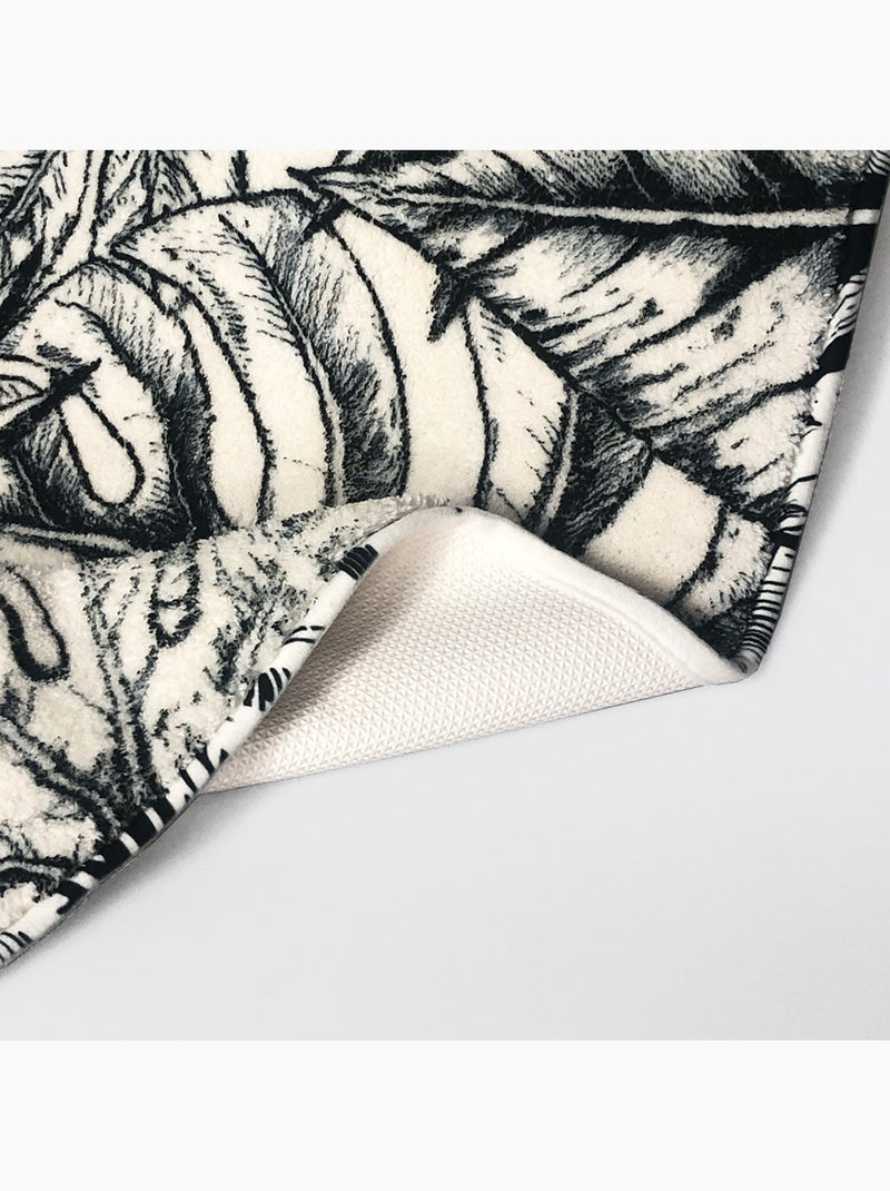 Alfombrilla de baño antideslizante con estampado de hojas Negro Azul marino Blanco - Kiabi