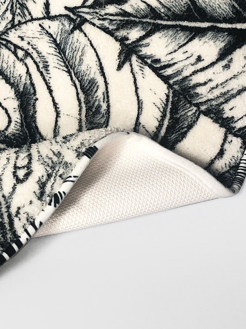 Alfombrilla de baño antideslizante con estampado de hojas Negro Blanco - Kiabi
