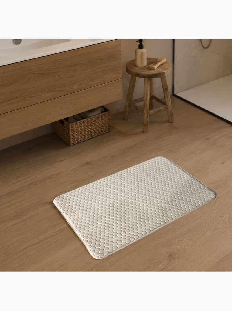 Alfombrilla de baño de espuma viscoelástica con diseño de panal. Crudo - Kiabi