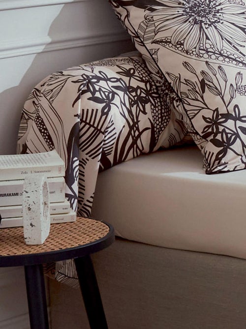 Almohada cilíndrica con estampados negros - Kiabi Almohada cilíndrica con estampados negros - Kiabi