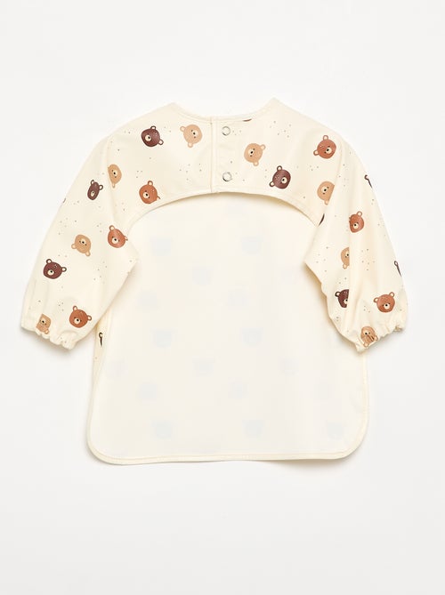 Babero delantal impermeable - Kiabi Babero delantal impermeable - Kiabi