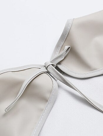 Babero delantal para bebé