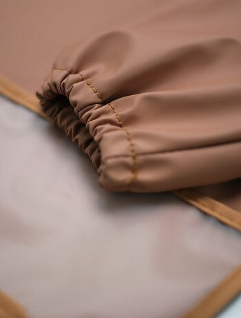 Babero delantal para bebé