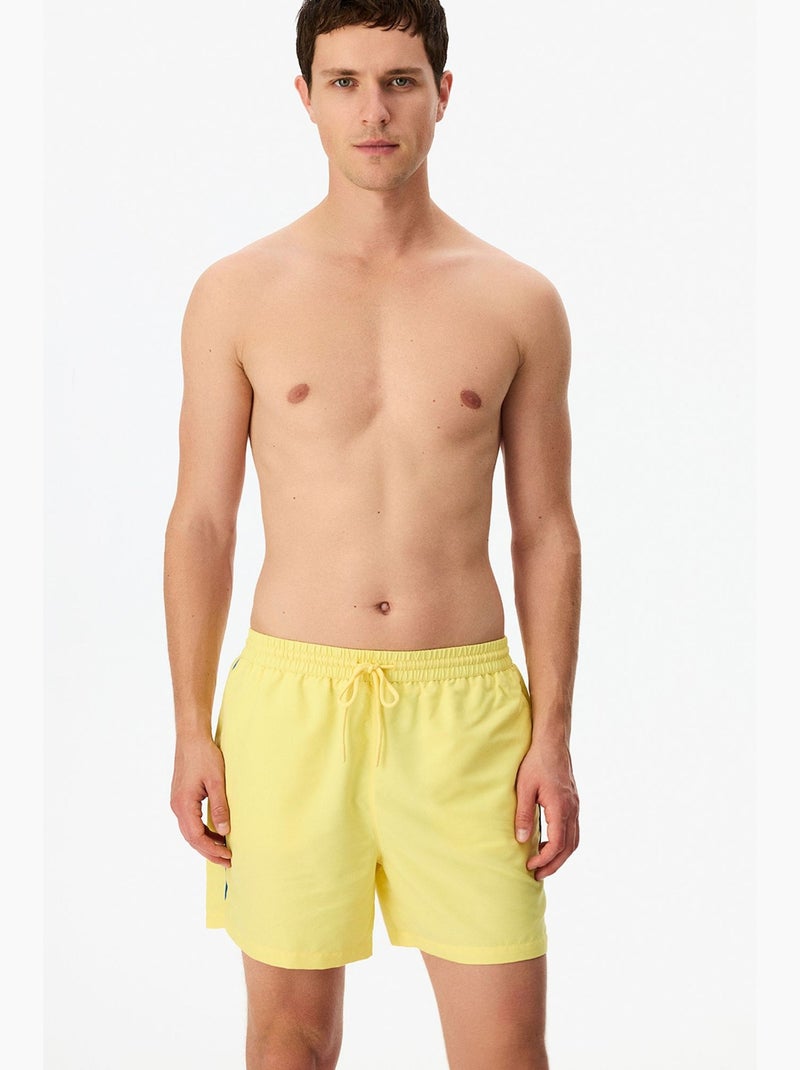 Bañador corto de hombre opposite line penti Amarillo limón - Kiabi