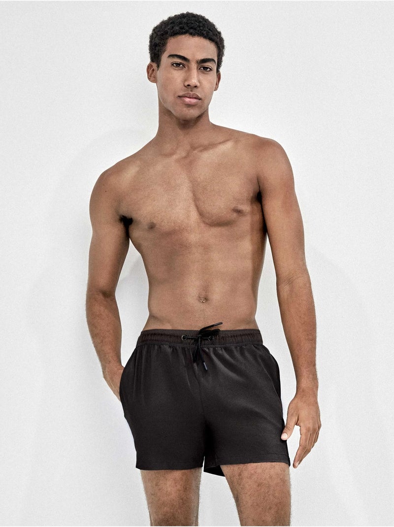 Bañador de hombre ajustable en cintura tejido de secado rápido Negro - Kiabi