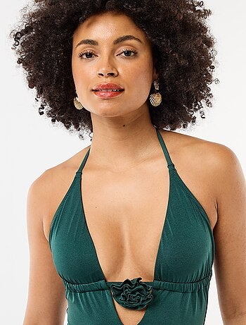 Bañador de una pieza con flor en el escote