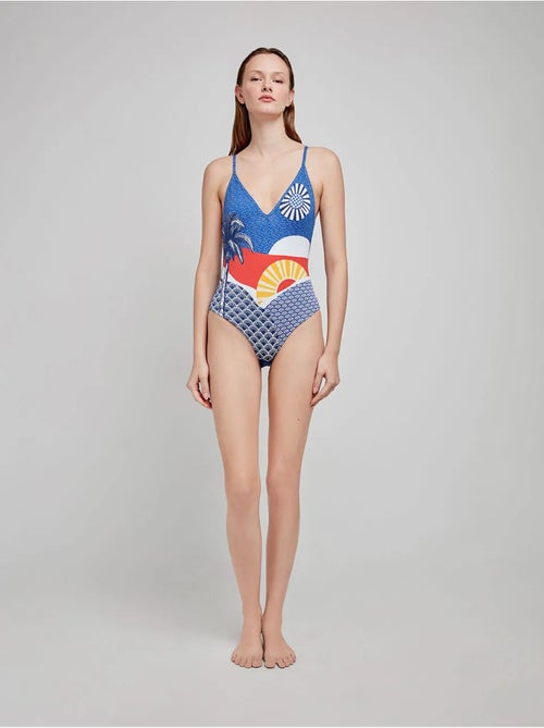 Bañador estampado cuello halter, sin aro y con tirantes regulables - Kiabi Bañador estampado cuello halter, sin aro y con tirantes regulables - Kiabi