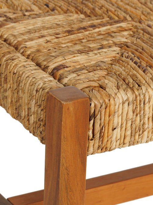 Banco trenzado de fibra natural con estructura de madera - Kiabi Banco trenzado de fibra natural con estructura de madera - Kiabi