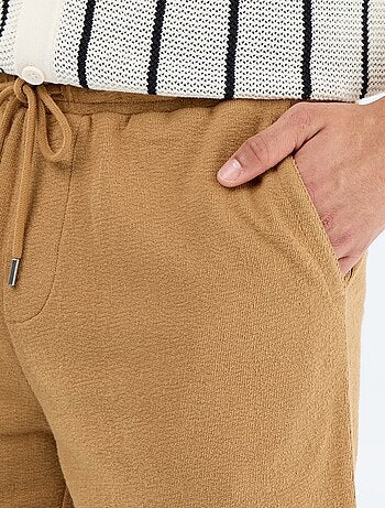 Bermuda con cintura elástica y cordones