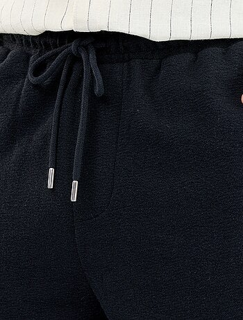 Bermuda con cintura elástica y cordones