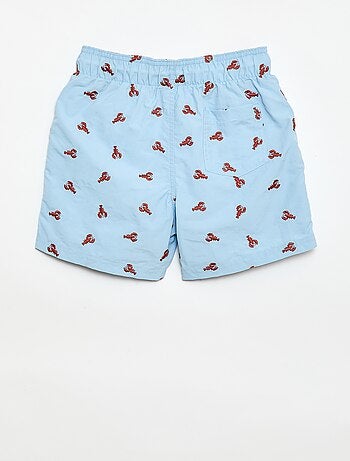 Bermuda de baño estampado integral con motivos tropicales