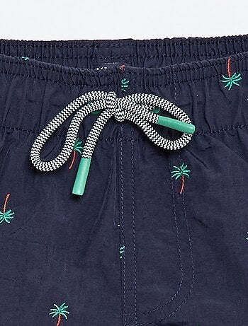 Bermuda de baño estampado integral con motivos tropicales