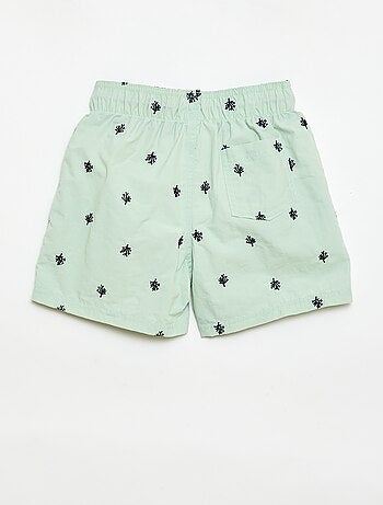 Bermuda de baño estampado integral con motivos tropicales