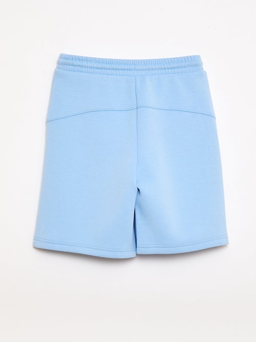 Bermuda de felpa con bolsillos con cremallera - Kiabi