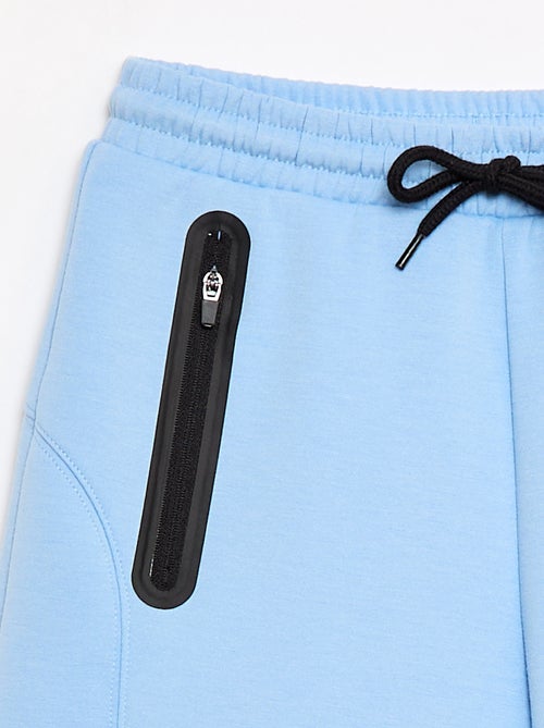 Bermuda de felpa con bolsillos con cremallera - Kiabi