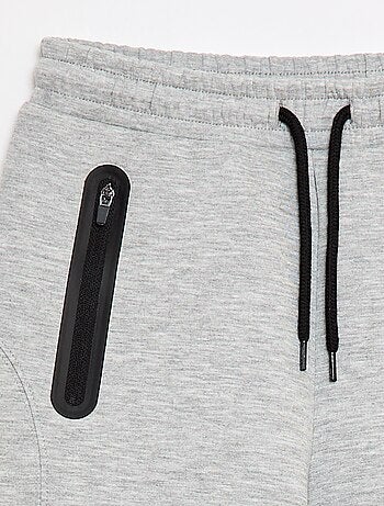 Bermuda de felpa con bolsillos con cremallera