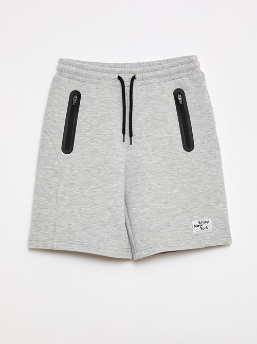 Bermuda de felpa con bolsillos con cremallera - Kiabi