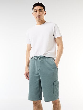 Bermuda de felpa ligera con bolsillos con solapa