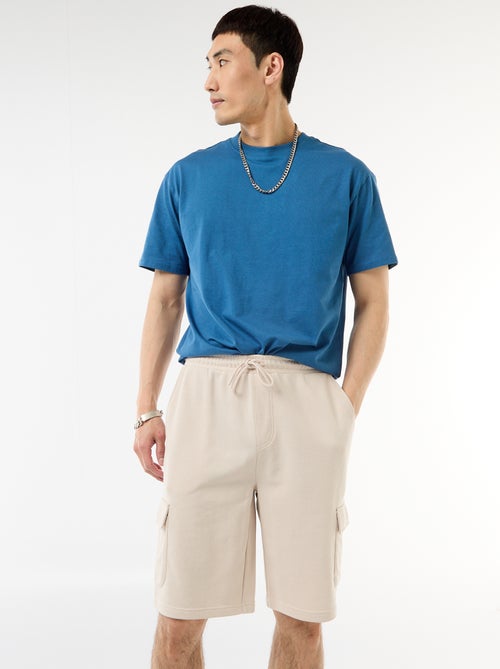 Bermuda de felpa ligera con bolsillos con solapa - Kiabi