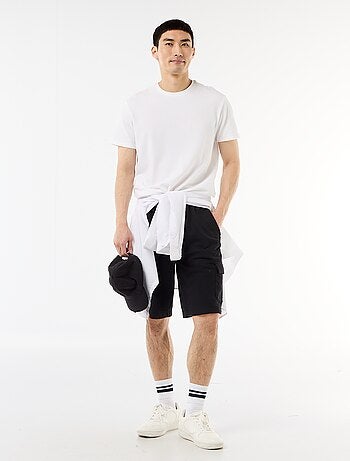 Bermuda de felpa ligera con bolsillos con solapa