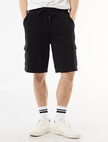 Bermuda de felpa ligera con bolsillos con solapa