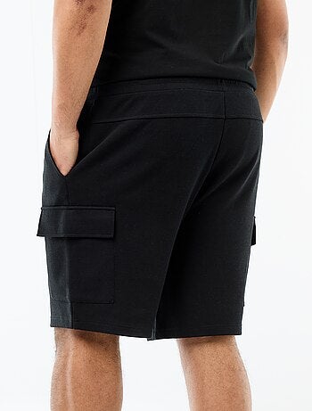 Bermuda de punto piqué con bolsillos de solapa