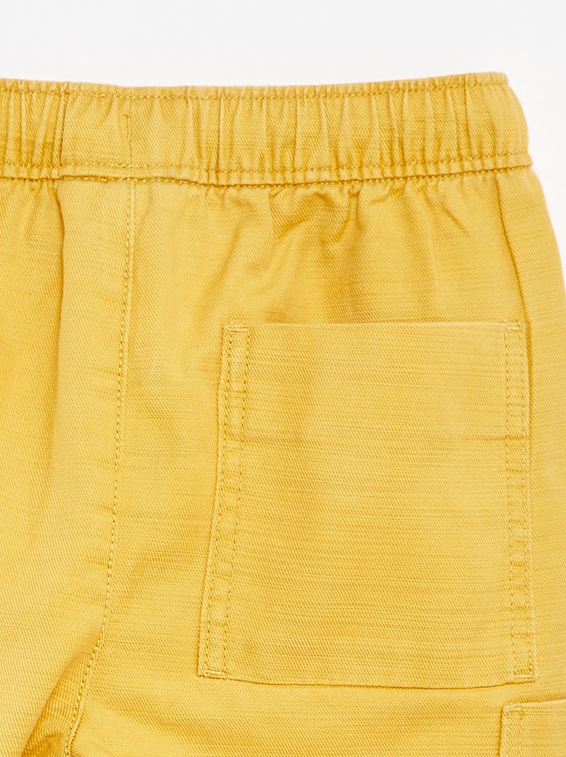 Bermudas lisas de sarga con bolsillos amarillo - Kiabi