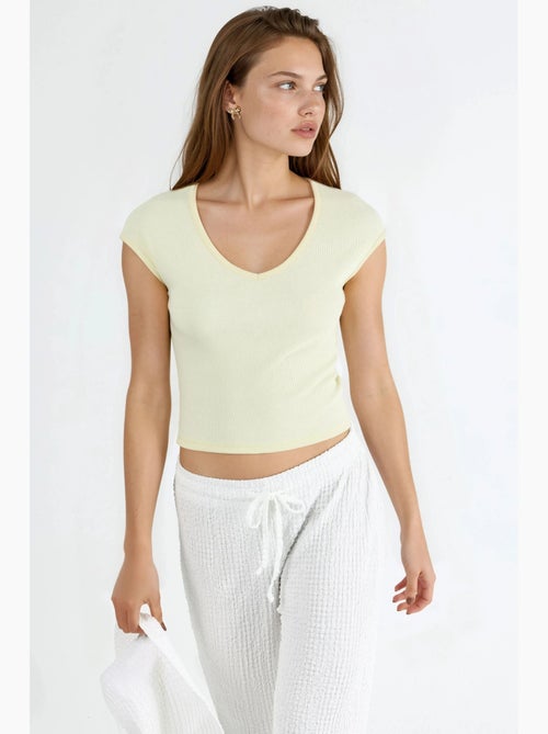 Blusa acanalada con cuello en v busem - Kiabi Blusa acanalada con cuello en v busem - Kiabi