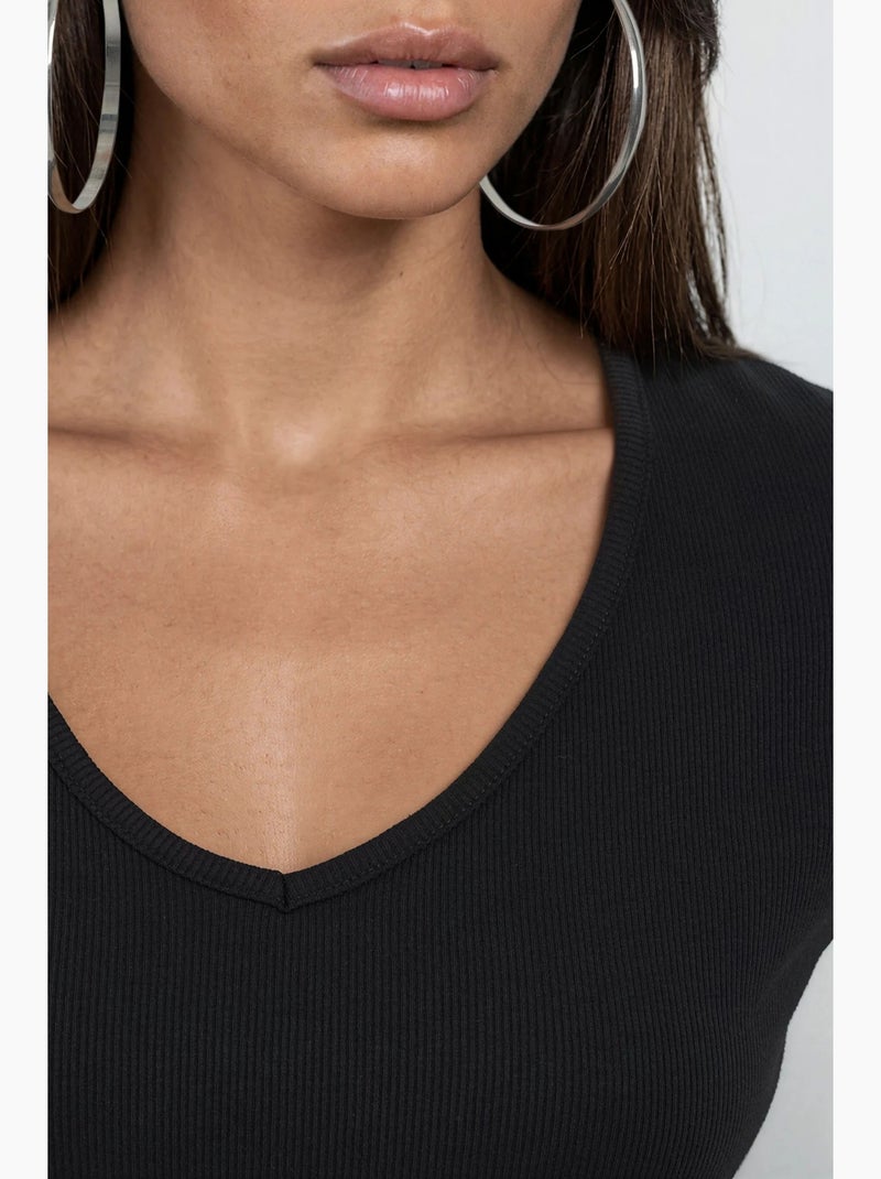 Blusa acanalada con cuello en v busem Negro - Kiabi