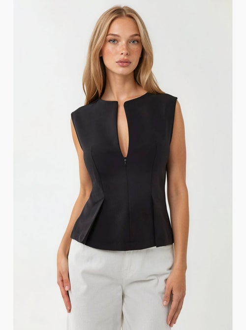 Blusa ajustada con cuello con cremallera hiccup - Kiabi Blusa ajustada con cuello con cremallera hiccup - Kiabi