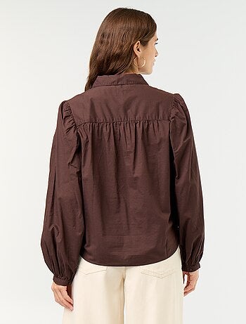 Blusa con cuello abotonado