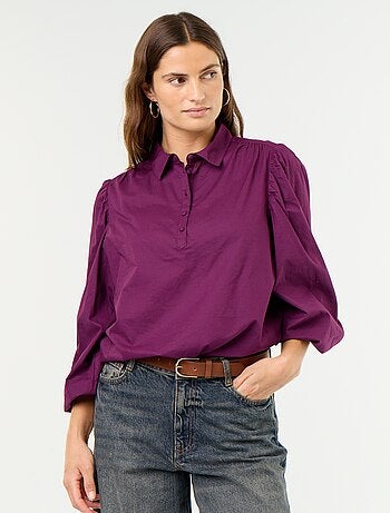 Blusa con cuello abotonado