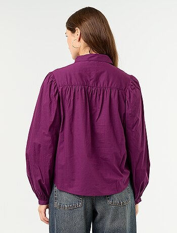 Blusa con cuello abotonado