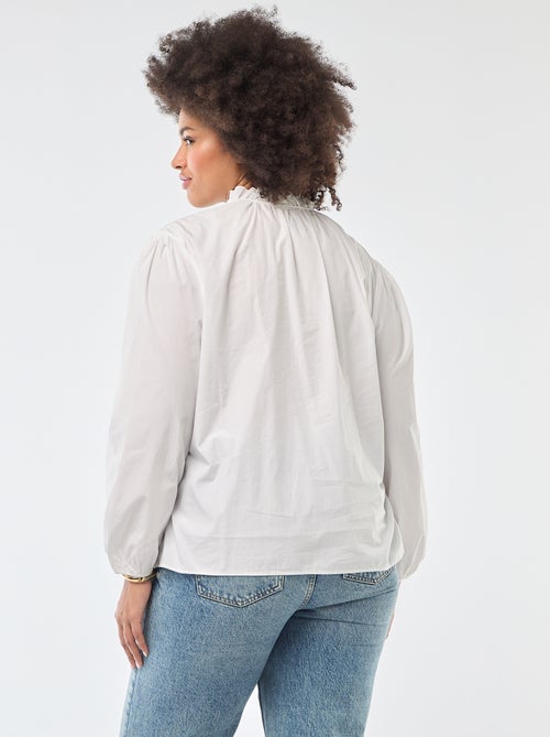 Blusa con cuello alto con volantes - Kiabi