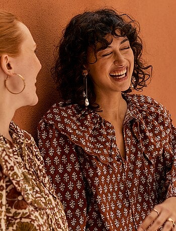 Blusa con cuello bebé amplio