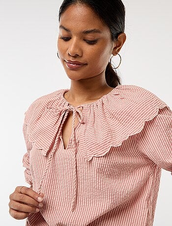 Blusa con cuello bebé amplio